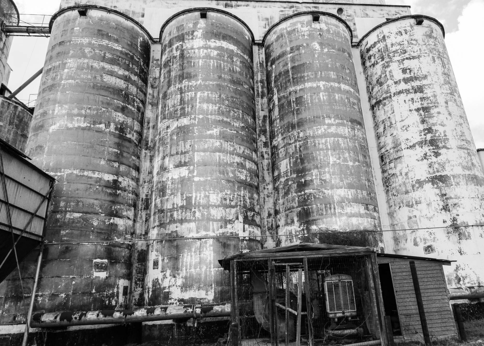 Black and white close view of the concrete silos